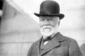 Andrew Carnegie wearing a suit and hat